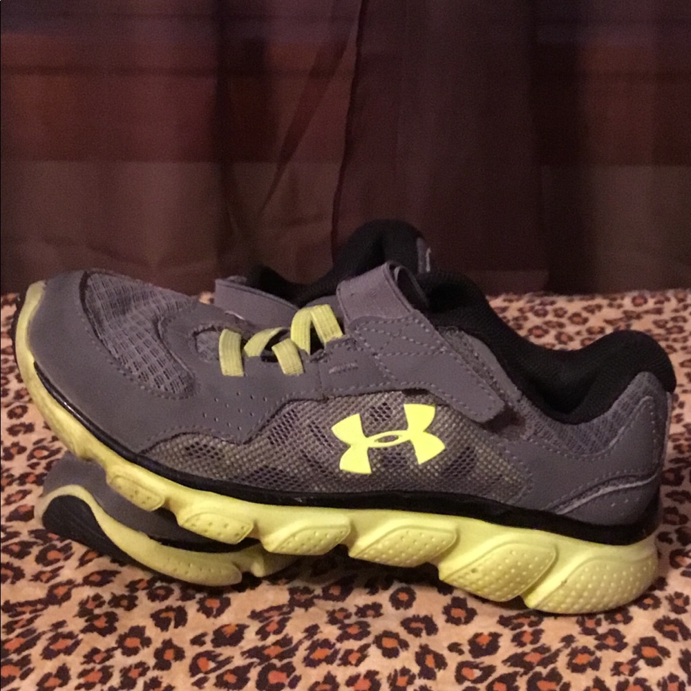 Boys UA sneakers.